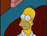 a cartoon of homer simpson sitting on a red couch