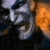 a blurred image of a person with a mask on