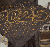 a black graduation cap with the year 2025 written on it