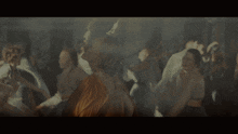 a blurry picture of a woman in a yellow dress