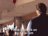a man in a suit says " i have to check on my aquarium " in a restaurant