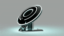 a black and white object with a circle in the middle