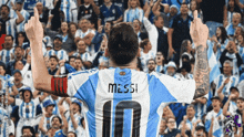 a soccer player wearing a jersey that says messi 10