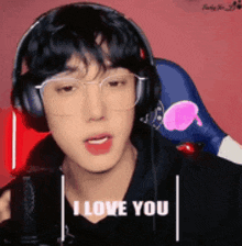 a man wearing headphones says i love you