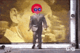 a cartoon of a man in a suit with a red head and sunglasses