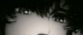 a black and white photo of a person 's face