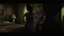 a man is holding a woman on his shoulders in a dark room