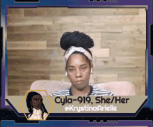 a woman named cyla-919 sits in a pink chair