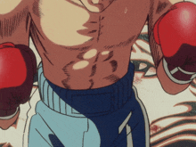 a man wearing boxing gloves has the number 1 on the bottom of his shorts