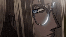 a close up of a man 's face with glasses and long hair