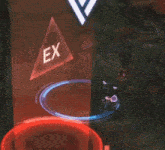 a triangle with the word ex on it is surrounded by a circle and a butterfly in a video game .
