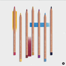 a row of colored pencils with the word caran d'ache on them