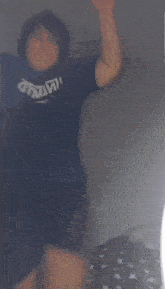 a person wearing a shirt that says athens is dancing