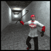 a man in a white shirt with the word virtual on it is holding a stick