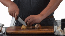 chopping apple two plaid aprons slicing apple preparing the apple cutting the apple