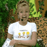 a woman wearing a t-shirt that says " twiety "