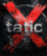 a blurred image of the word tatic with a red x in the middle