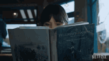 Reading A Book Wednesday Addams GIF - Reading A Book Wednesday Addams Jenna Ortega GIFs