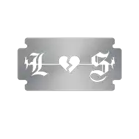 a stainless steel razor blade with a broken heart and letters l and s on it