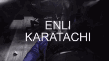 a black and white photo with the words enli karatachi written on it
