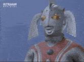 a man and a woman are standing next to each other in a field with the word ultraman on the bottom