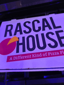 a sign that says rascal house a different kind of pizza