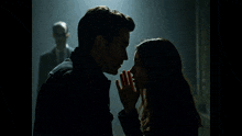 a man and a woman are kissing with the words " it isn 't what they say about you "