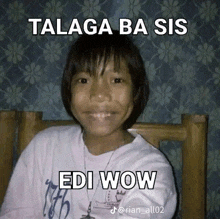a young boy is sitting on a bed with a meme on his face that says edi wow .