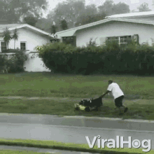 Mowing Lawn Rainy Day GIF - Mowing Lawn Rainy Day Wtf Chores GIFs
