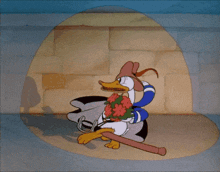 a cartoon of donald duck laying on the floor with a sword in his hand