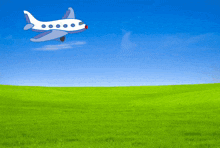 a penguin is standing in a grassy field next to a plane carrying a bucket