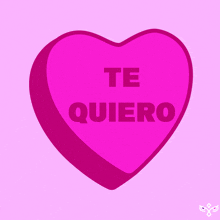 a pink heart with the words te quiero written on it