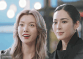 a couple of women standing next to each other with the words lindormgifs above them