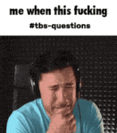 a man wearing headphones is crying with the words me when this fucking #tbs-questions above him