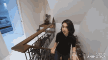 a woman is standing on a set of stairs made in animotica