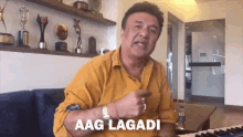 Aag Lagadi Anu Malik GIF - Aag Lagadi Anu Malik Anu Malik Aag Lagadi GIFs