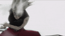 a blurry picture of a person with the letters nsnlxd on the bottom