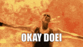a man with his arms outstretched says " okay doei " in front of an explosion