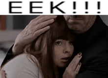 a man holds a woman in his arms with the words eek above them