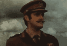 Man With Growing Mustache GIF - Mustache Captain General GIFs