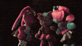 three dolls are standing on a stage and one of them has a skull on her shoe