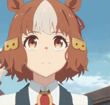 a close up of a cartoon character with the letter b on her head