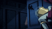 a man holding a gun in a dark room