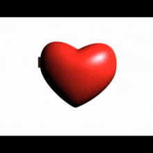 a red heart shaped mirror with a man 's face in it