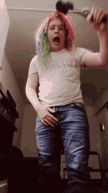 a girl with a wig and a shirt that says since 1993