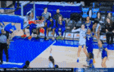 a basketball game is being shown on espn with the headline top news