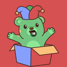 a green teddy bear wearing a jester hat is coming out of a cardboard box