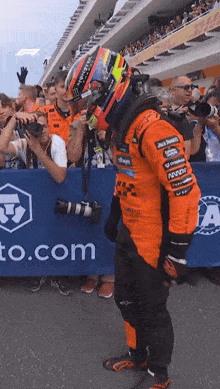a man wearing a helmet that says jack daniels on it