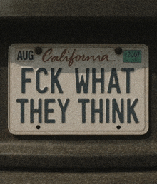 a california license plate reads " fck what they think "