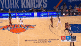 a york knicks basketball game is being played in madison square garden